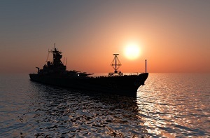 Un barco en el mar y amaneciendo el sol