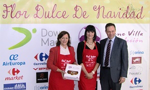 Irene junto a la presidenta de Down Madrid, Inés Álvarez, y el vicepresidente, Enrique Gil.