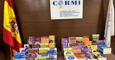 Mesa del Cermi donde se encuentran los ejemplares de sus publicaciones que regalarán por el Día del Libro y la Lectura (Fuente: Cermi)