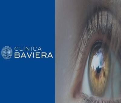 Banner de la Clínica Baviera con un ojo de fondo (Fuente: Discapnet)