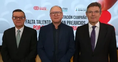 Los tres representantes de las entidades durante el evento