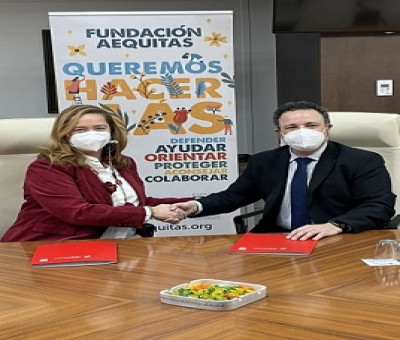 Almudena Castro-Girona (Fundación Aequitas) y Jesús García Lorente (Confederación Autismo España), tras la firma del acuerdo