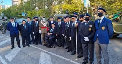 Foto de familia de los miembros de Acime al final del desfile de 2021 (Foto cedida a Servimedia)