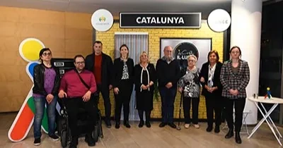 Representantes del acto en la recogida de los premios