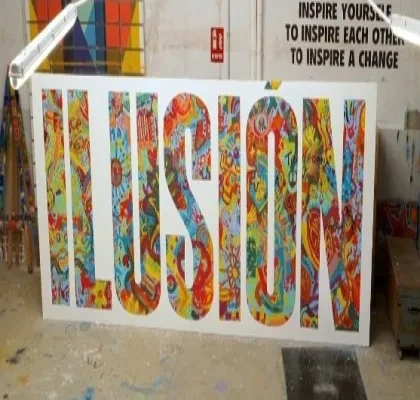 una pancarta con la palabra "ILUSIÓN"