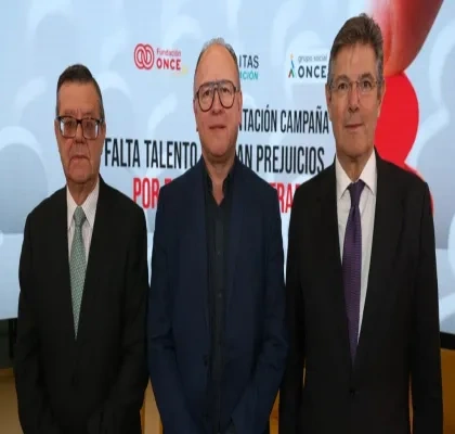 Los tres representantes de las entidades durante el evento