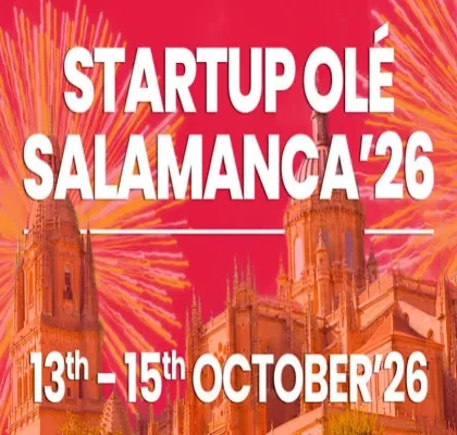 Cartel promocional de Startup Olé Salamanca 2026. La imagen muestra la Catedral de Salamanca con un fondo en tonos rojos y anaranjados, acompañado de fuegos artificiales. En la parte superior aparece el texto “STARTUP OLÉ SALAMANCA ’26” y, en la parte inferior, las fechas “13th – 15th OCTOBER ’26”. La composición destaca el carácter innovador e internacional del evento.