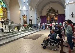 Personas con discapacidad durante una celebración en una iglesia (Fuente: Proyecto Naim)