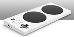 Guía de videojuegos accesibles - Dicapacidad Física: dispositivo rectangular con pulsadores grandes.